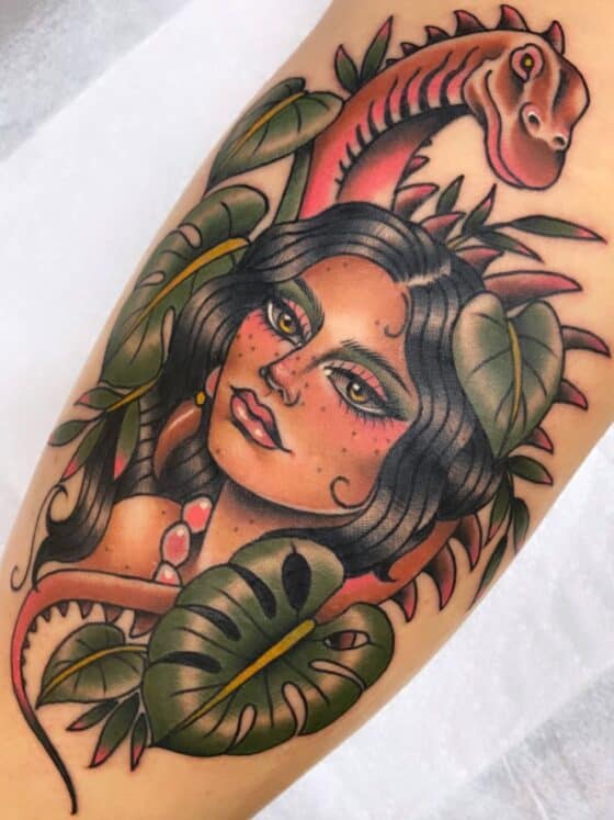 22 Beautiful Plant Tattoos To Admire 7 plant tattoo with woman