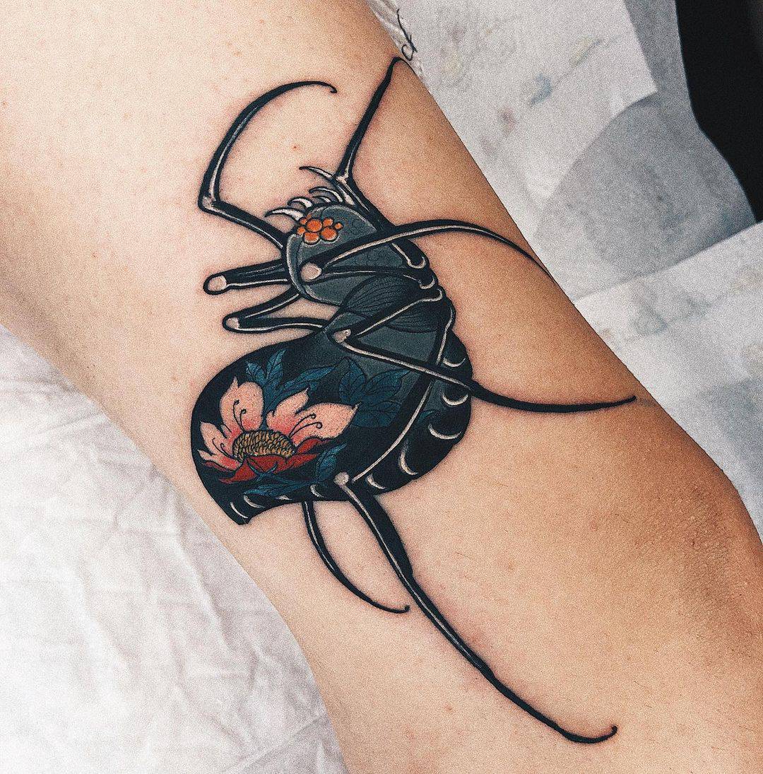 20 Looming Spider Tattoos You’ll Gladly Have Crawling On You