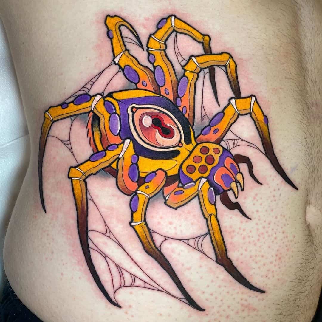 20 Looming Spider Tattoos You’ll Gladly Have Crawling On You