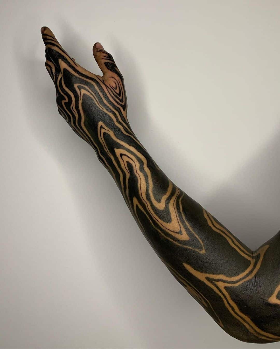 50 Beautiful Blackout Tattoos With White Ink For Perfect Contrast