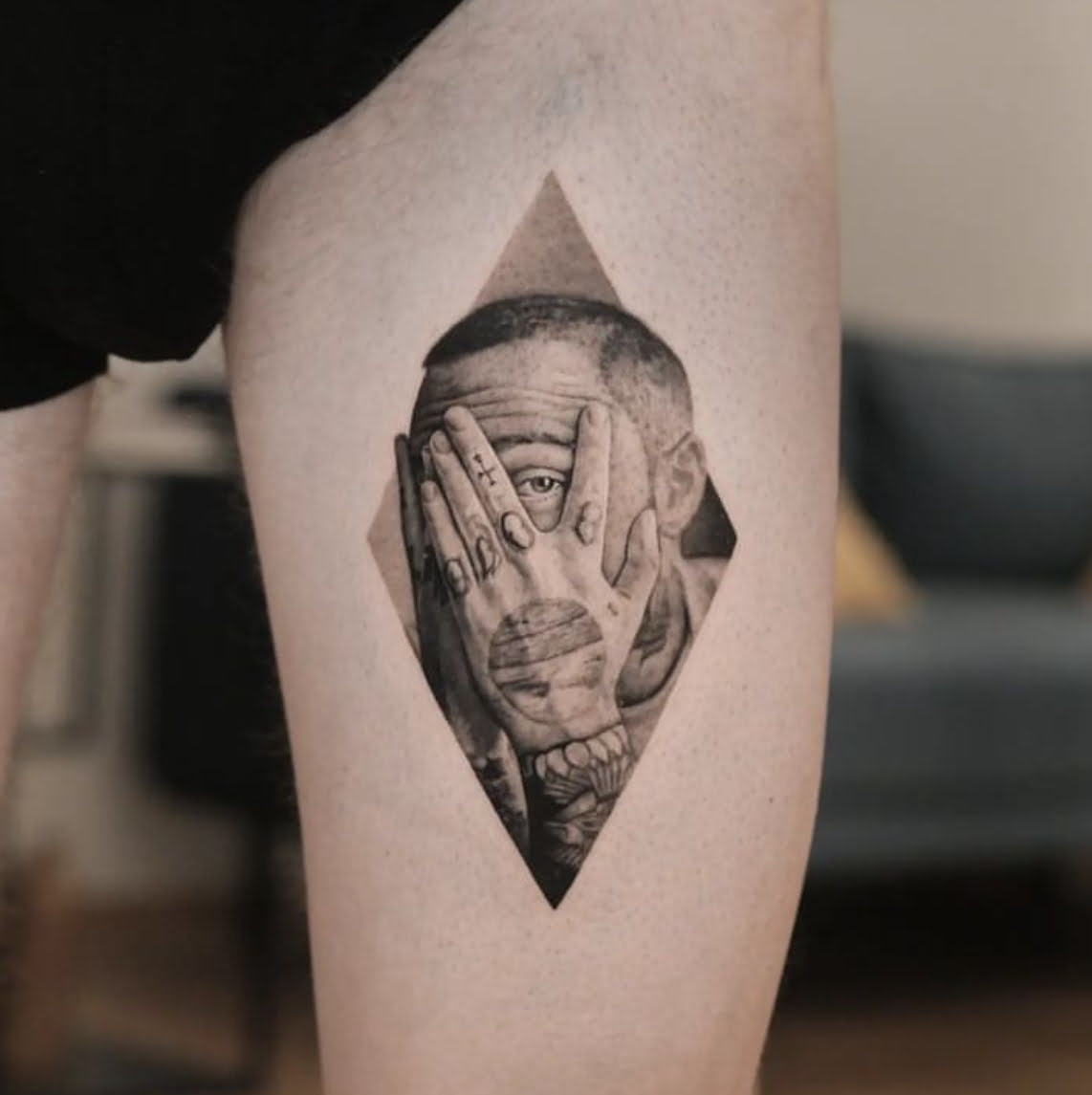 Micro-realist Mac Miller tattoo on inner forearm