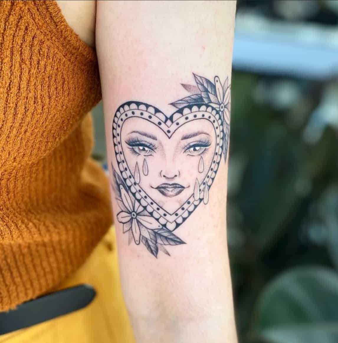 heart inside heart tattoo