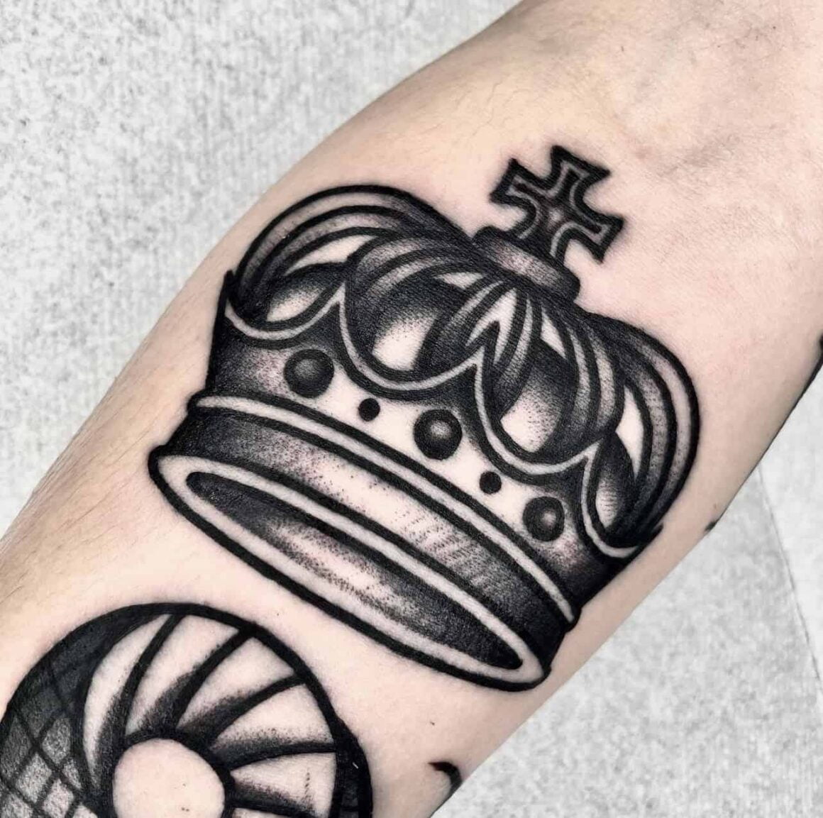 Tattoo uploaded by The God of Tattoos • Crown tattoo in all black with  littering. • Tattoodo