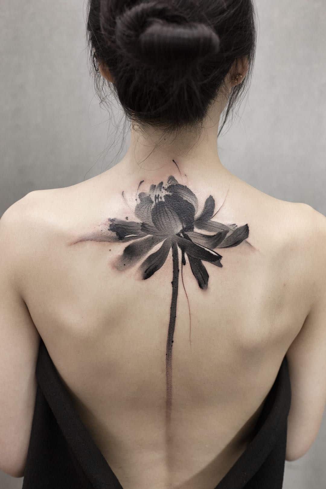 Tattoo uploaded by Tara  koraykaragozlertulip flower spinetattoo   Tattoodo
