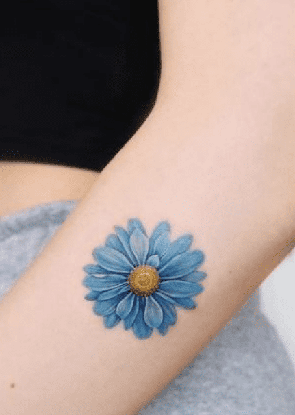 daisies tattoo on wrist