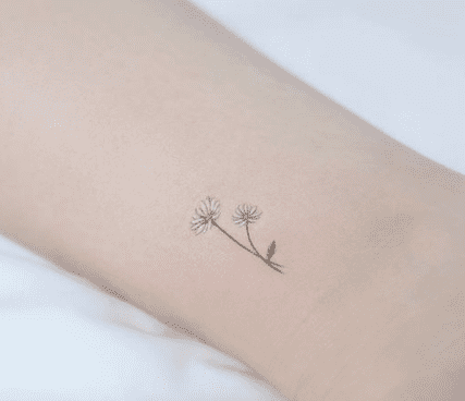 Small Daisy Tattoo for Feminine Charm