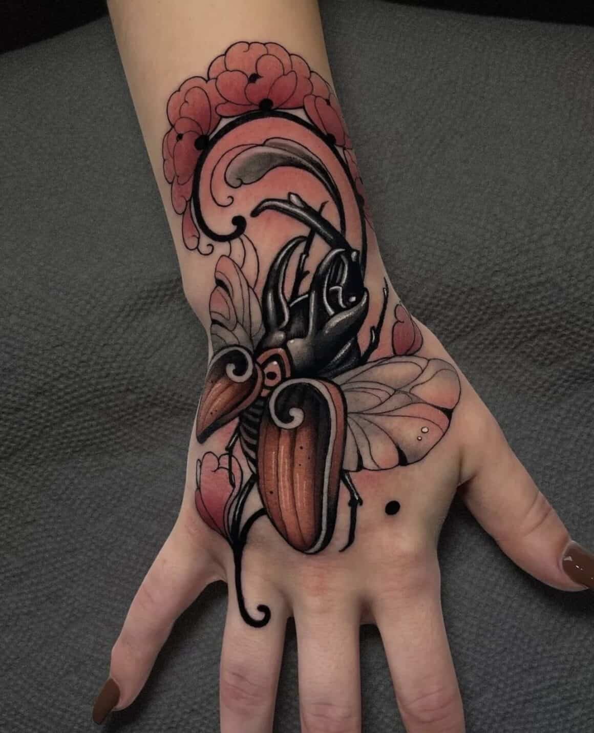 traditional hand tattoo owl