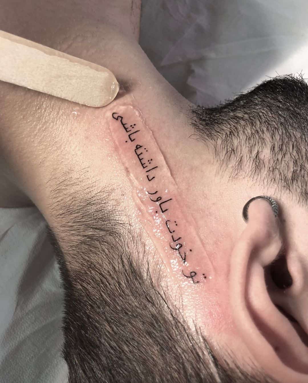 neck tattoos words