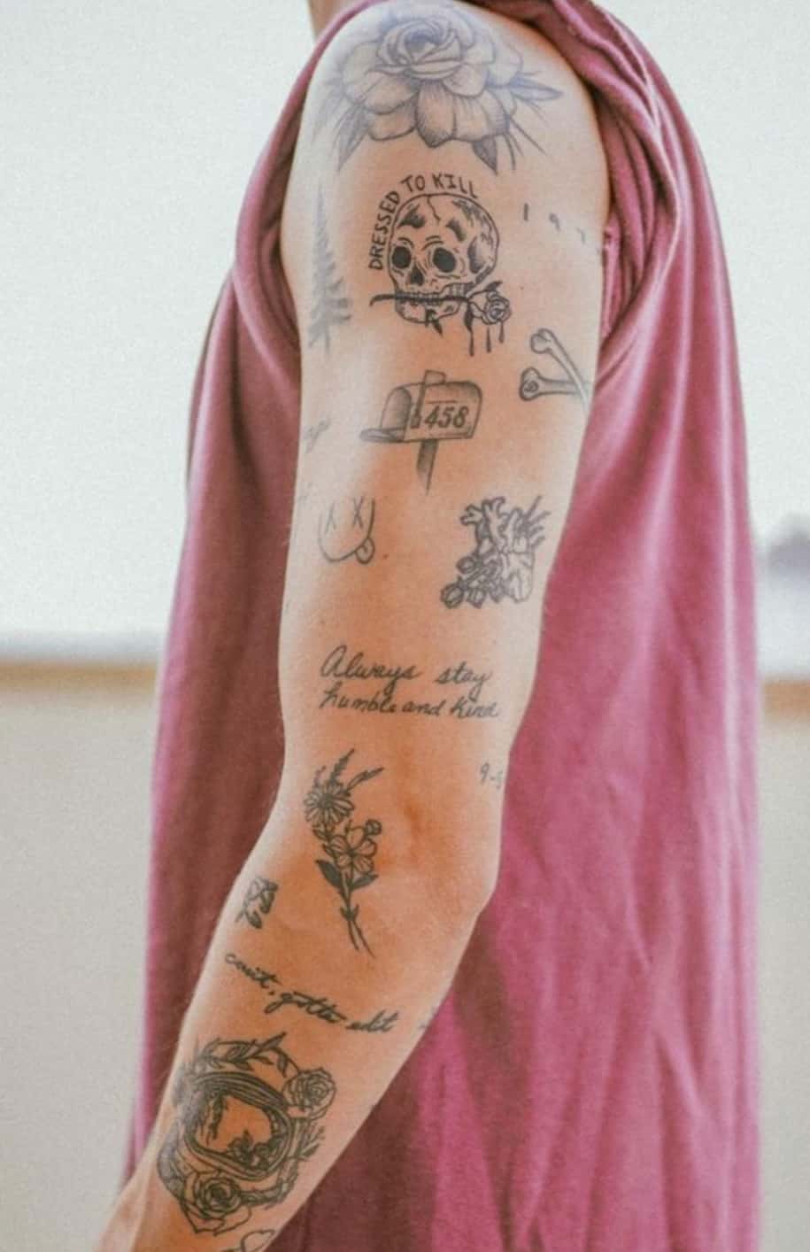 Unrecognizable Female Arm Covered with Tattoos · Free Stock Photo