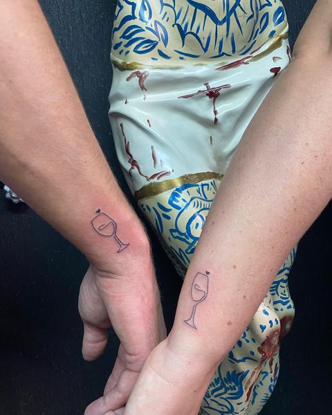 Fine line matching wine glass tattoo for best friends.