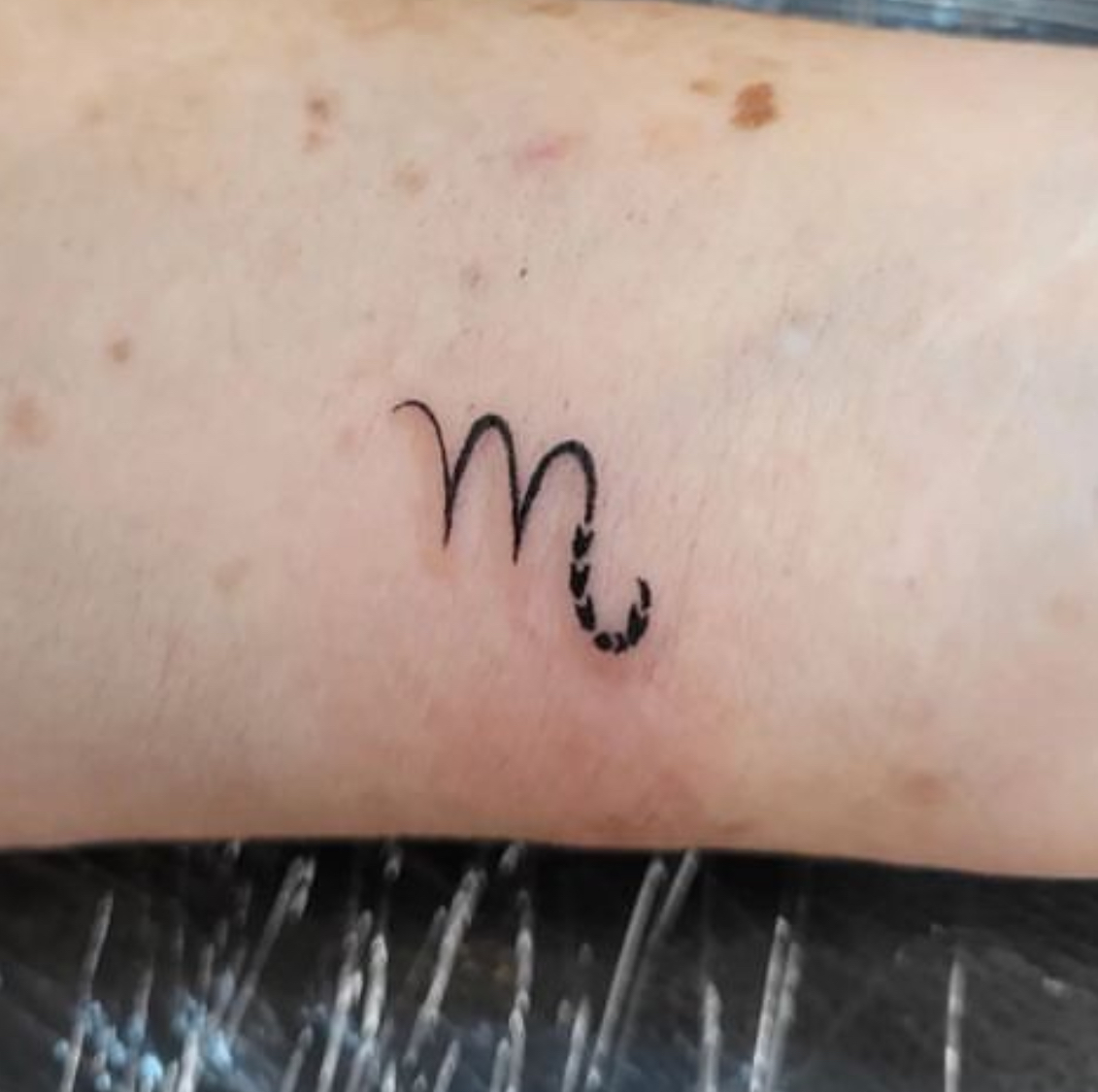 scorpio m tattoo