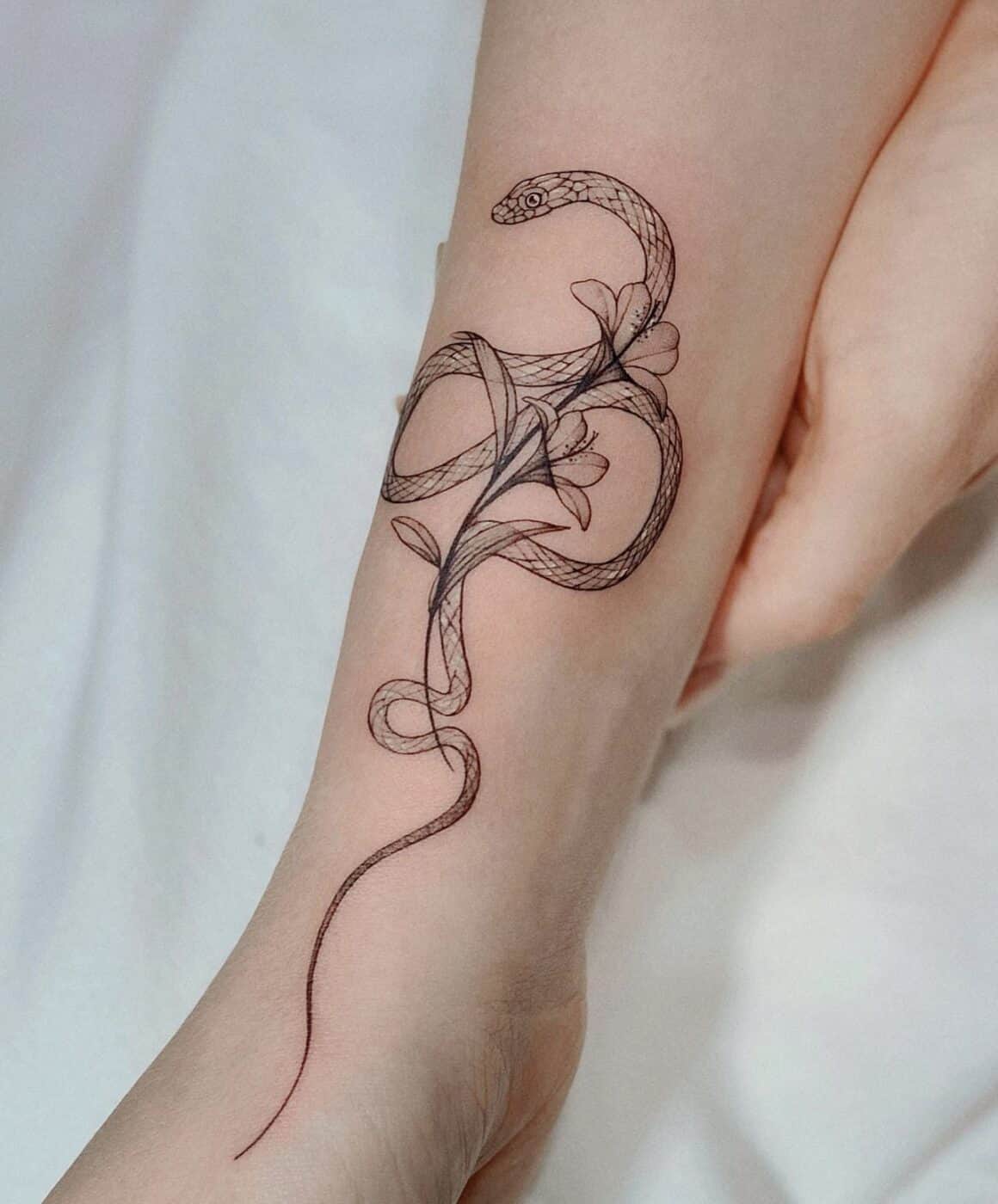 Snake Tattoo for Girls #snaketattoo #tattoo #snake #tattoos #ink #inked  #tattooartist #blackwork #art #tattooart #traditionaltattoo  #blackworktattoo #snakes #tattooideas #tattooed #blackandgreytattoo  #skulltattoo #tattoodesign #blacktattoo ...