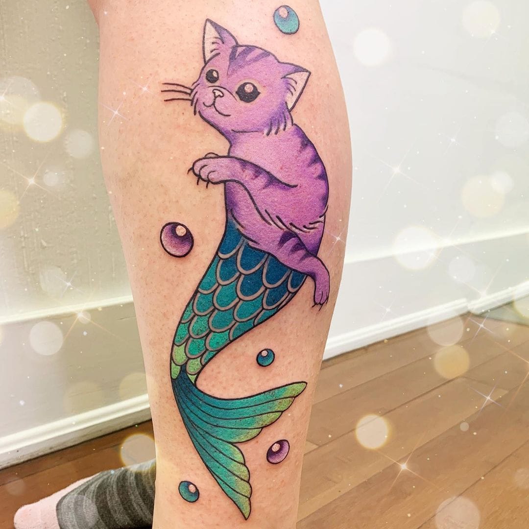 Mermaid tail tattoo on the left footshin