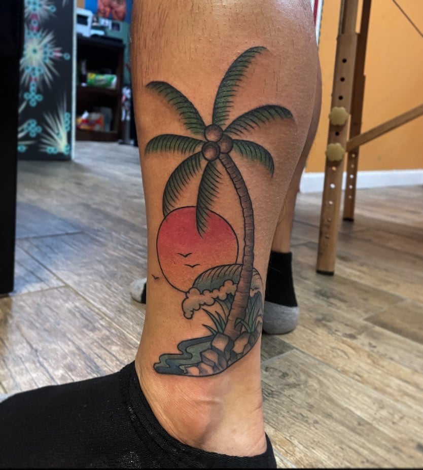 23 Harmonious Palm Tree Tattoos and Symbolism Behind Them | Palm tree tattoo,  Palm tattoos, Cool tattoos