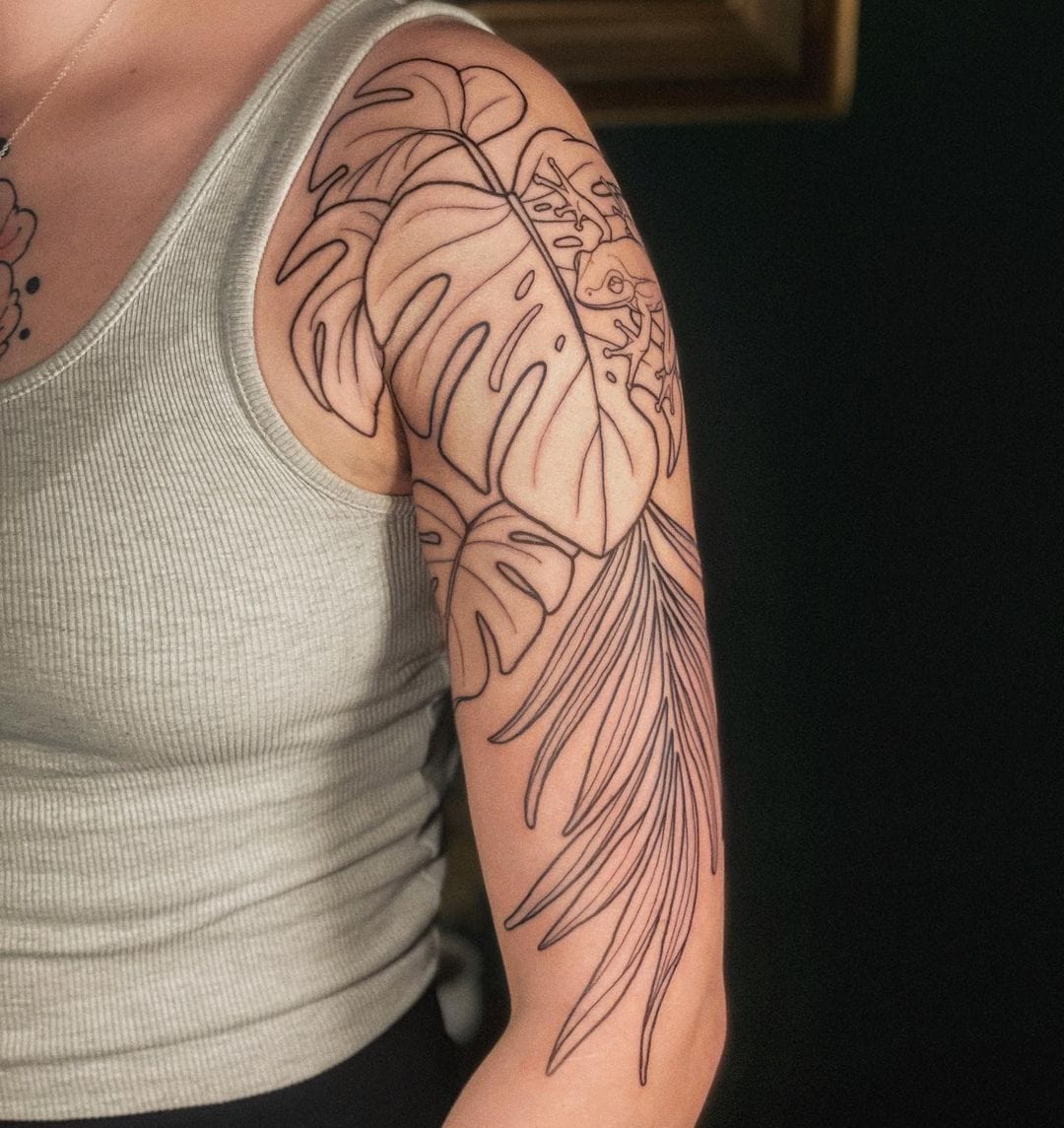 Palm leaf tattoo located on the forearm, illustrative