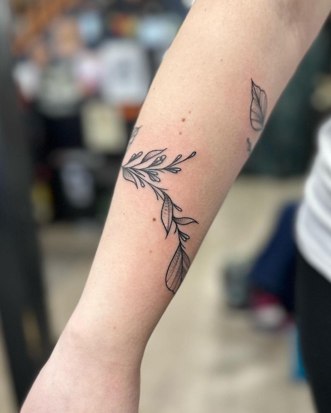 vine tattoo designs on arm